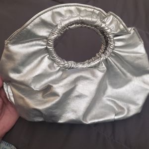Silver clutch purse.